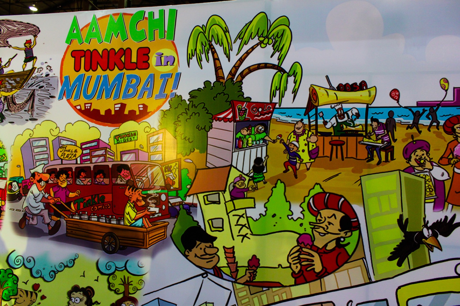 Colourful Tinkle comics banner at a convention stall