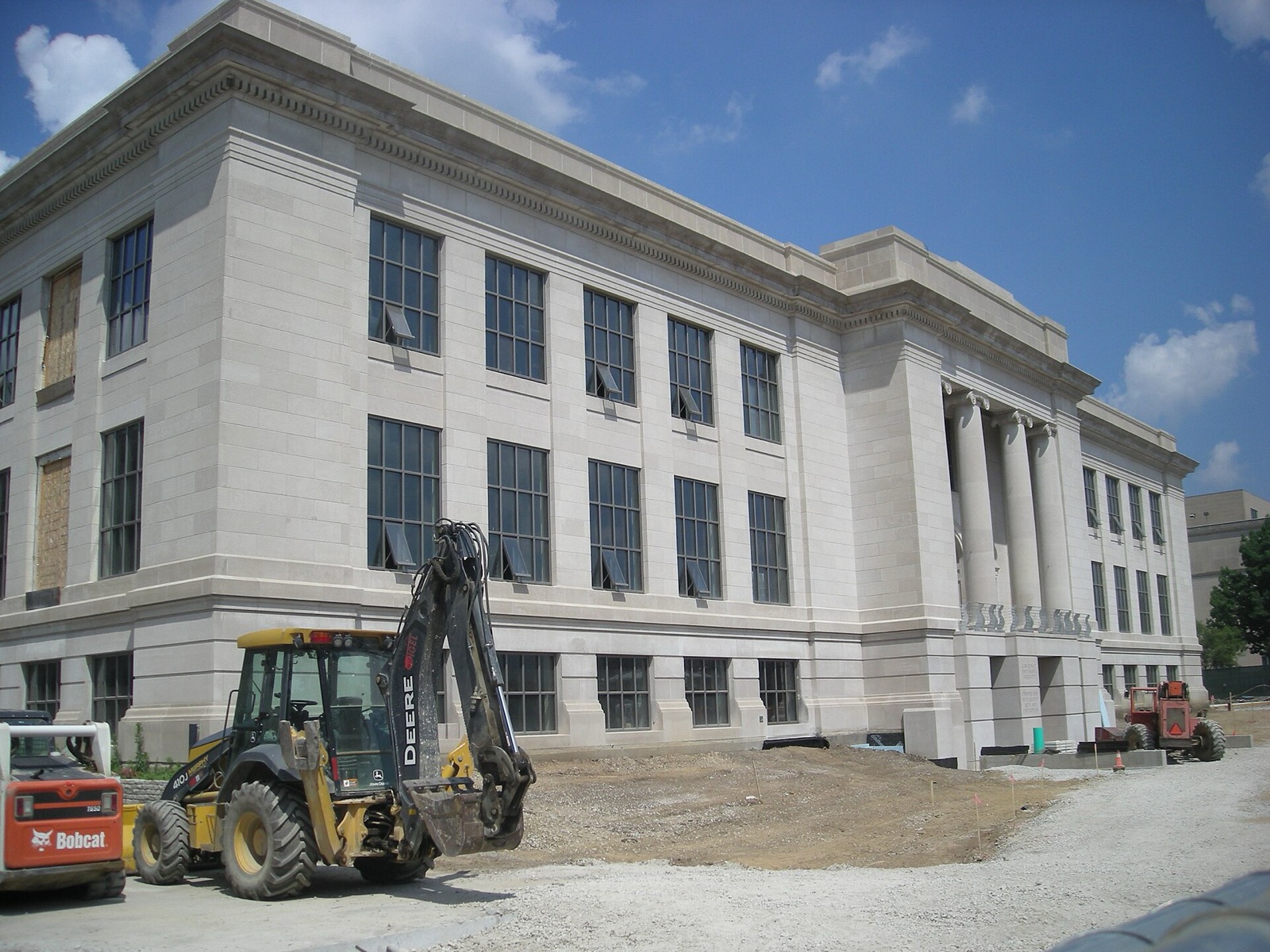 Stone facade of Sullivant Hall with construction equipment outside