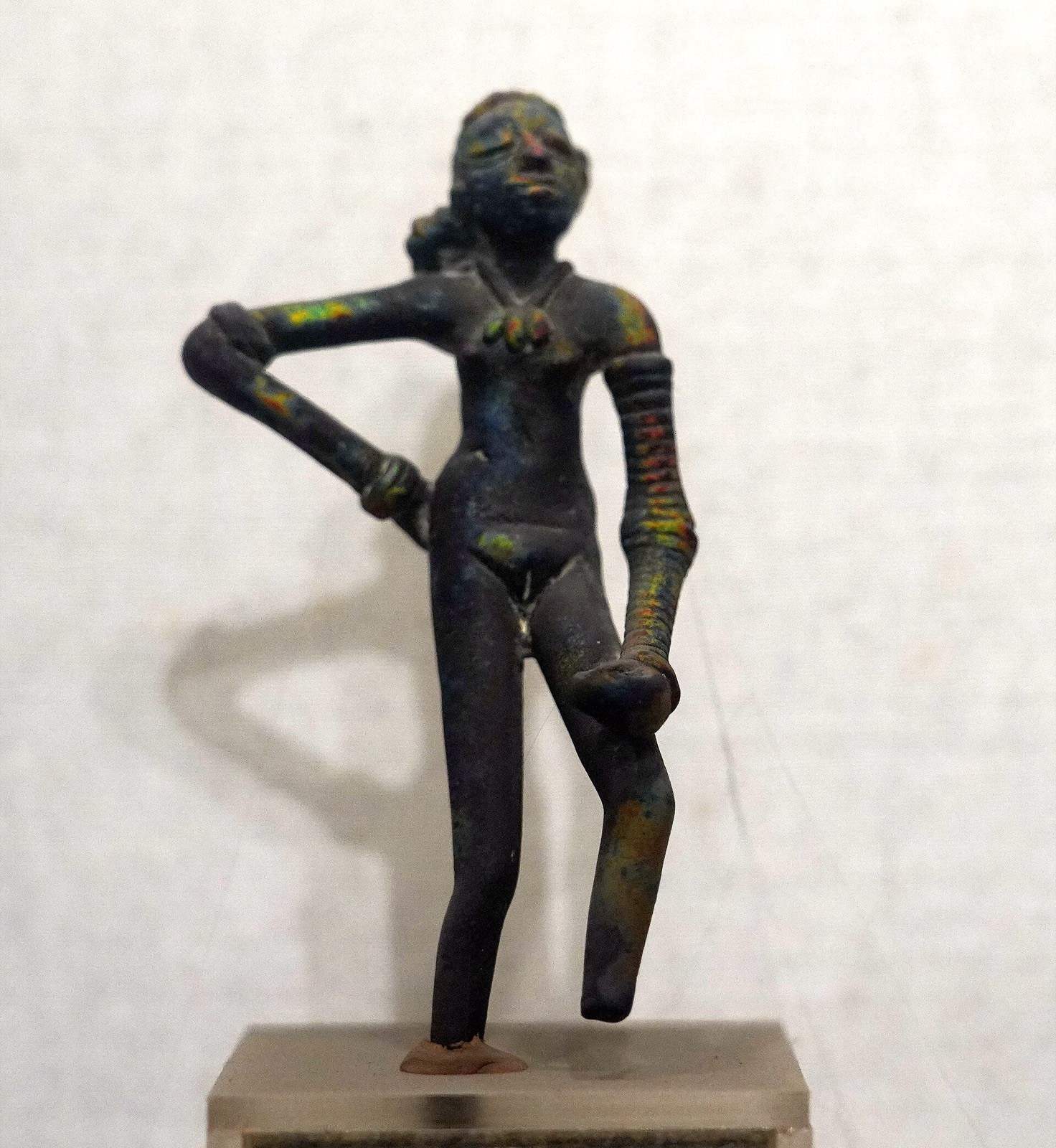 Small bronze statuette of the Indus Valley Dancing Girl at the National Museum, New Delhi