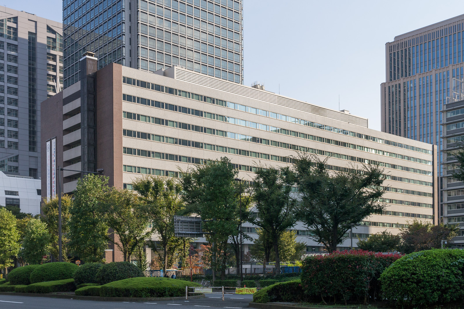 Large government office building surrounded by trees in central Tokyo