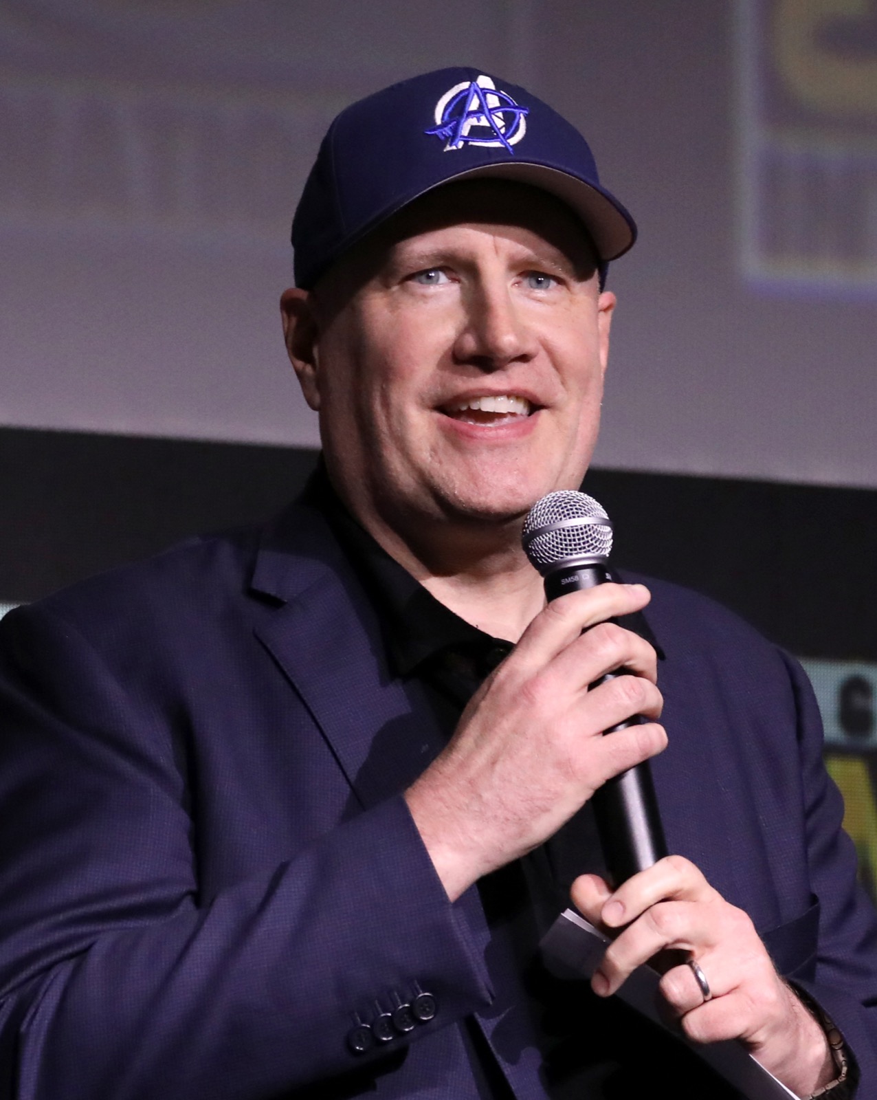 Kevin Feige speaking on a convention panel