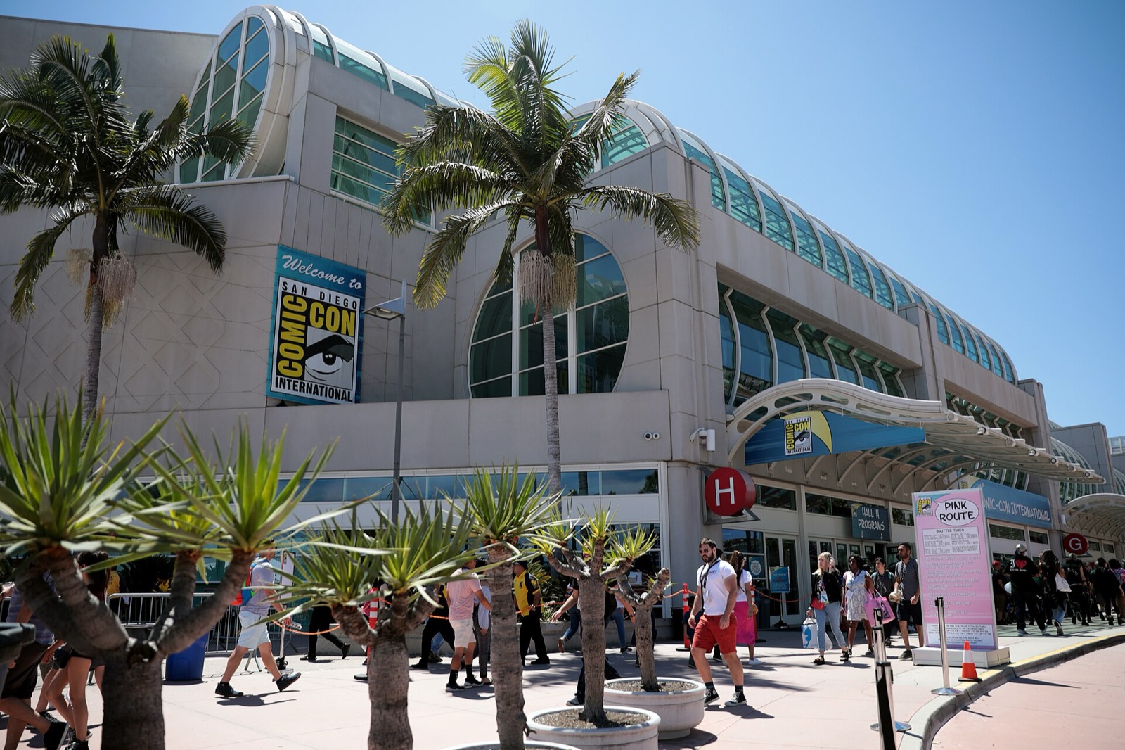 San Diego Convention Center exterior with a Comic-Con International banner and a Hall H sign