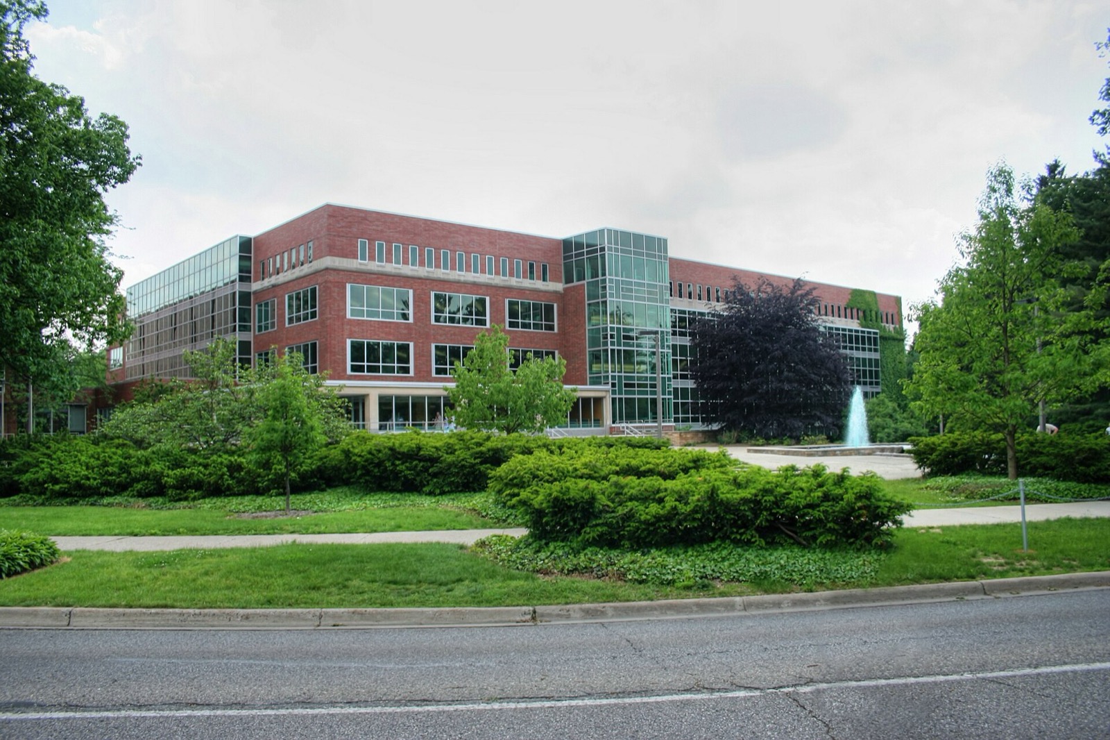 Red brick and glass facade of the Michigan State University Main Library