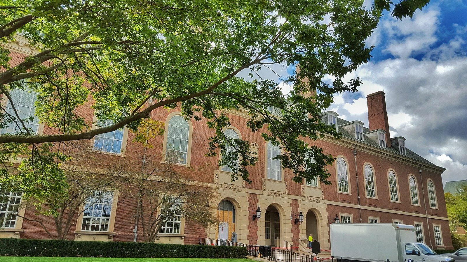 Brick facade with arched windows of the University of Illinois Main Library